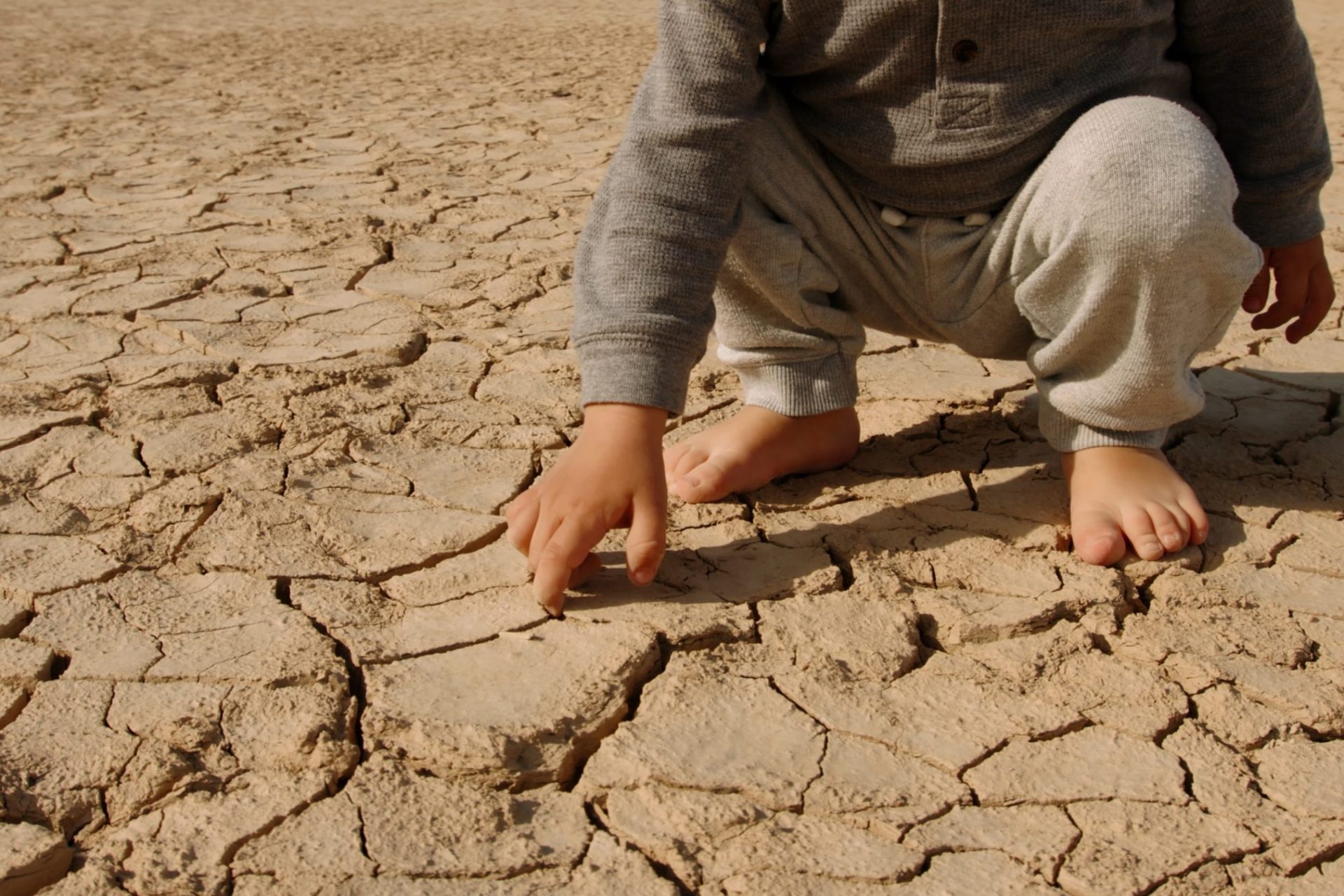 Close,Up,Shot,Of,Baby,Boy,Poking,Pieces,Of,Dry